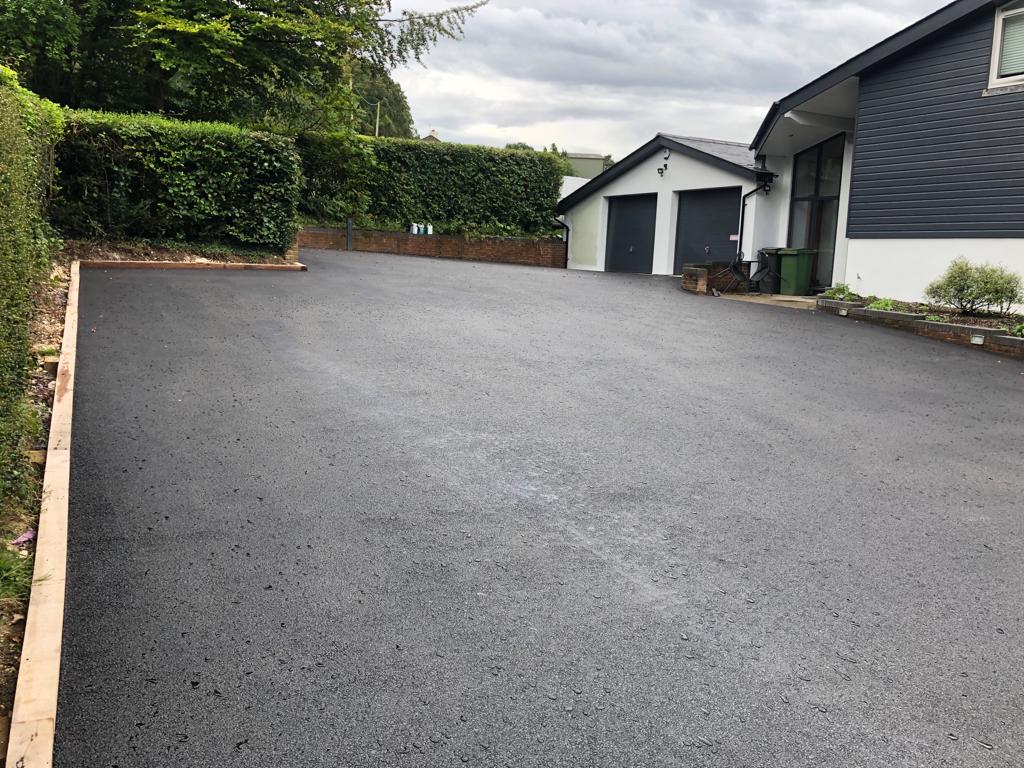 This is a photo of a asphalt driveway which is in the process of being installed by Muswellbrook Road Tek