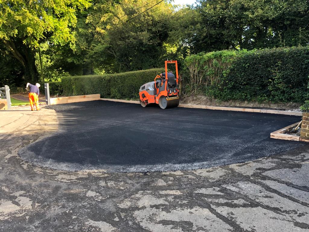 This is a photo of a bitumen driveway which is in the process of being installed by Muswellbrook Road Tek